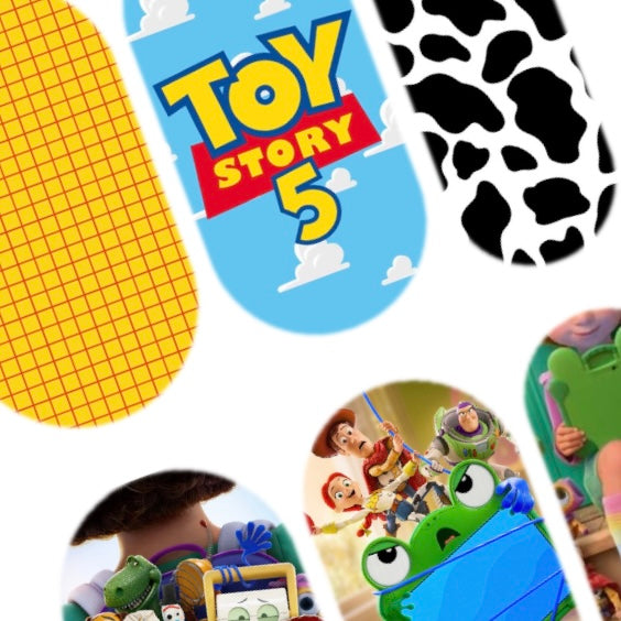 Close up of Lily Pad Adventures handmade nail decals with cloud and Toy Story 5 inspired nail art.